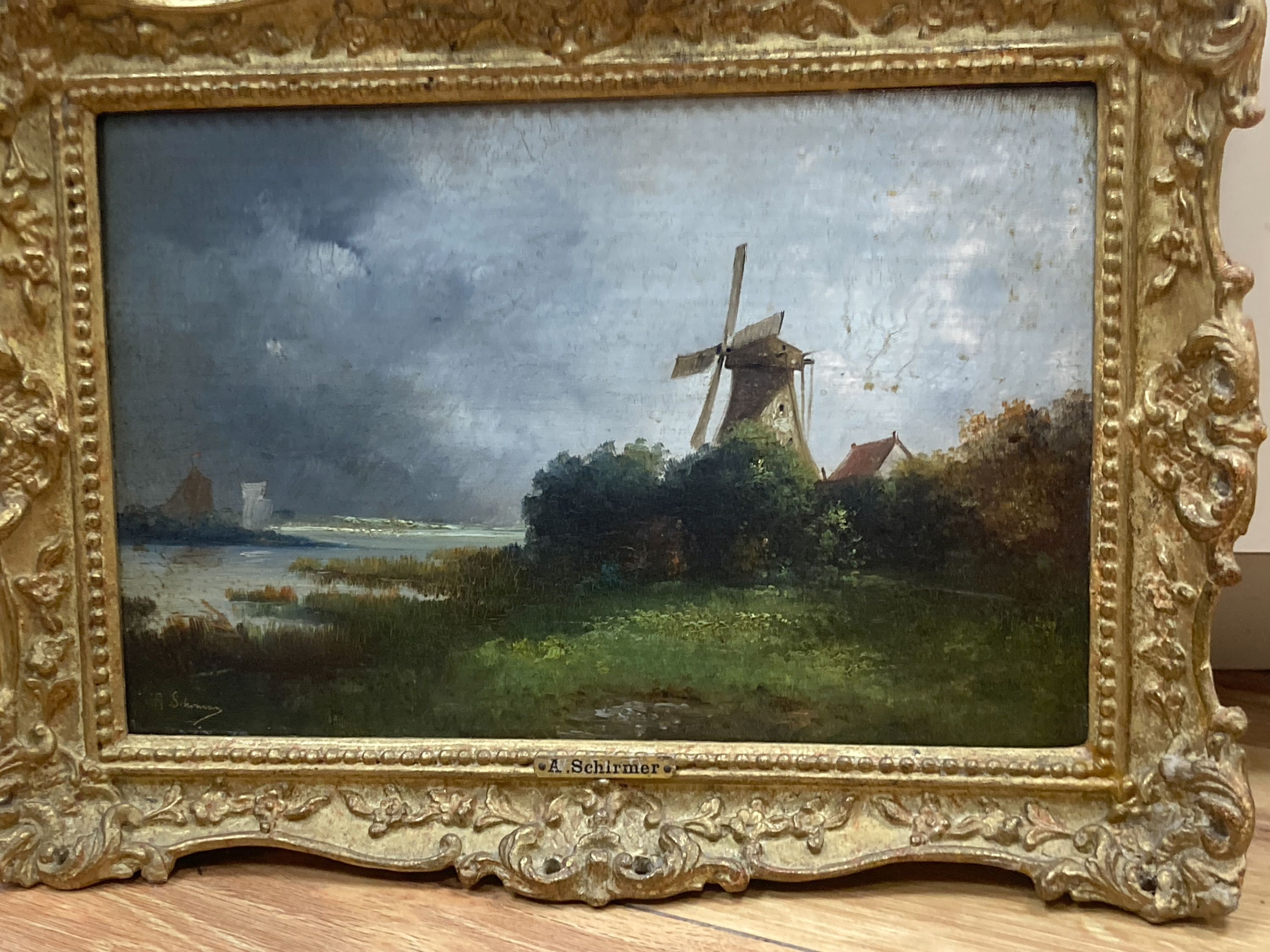 A* Schirmer, River landscape with mill, signed, oil on board, 17 x 26cm and a watercolour river landscape, 23 x 30cm.